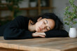 © jr-art - A woman is sleeping on a wooden table