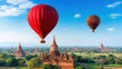 © JK_kyoto - Hot Air Balloons Floating Above Ancient Temples in Bagan Landscape