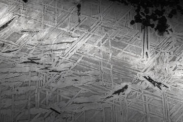 meteorite surface macro photo with chaotic metallic crysal pattern