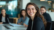 © Kateryna - Team Member Smiling Confidently at Conference Table in Modern Office