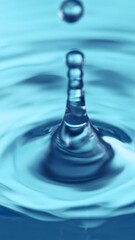 Fototapete - Super Slow Motion of Water Drops Falling Down in Extreme Detail. Filmed on High Speed Cinema Camera, 1000fps. Vertical Aspect Ratio.