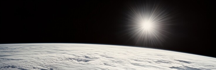 Wall Mural - the sun is shining over the clouds in the sky above the earth's surface