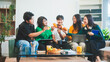 © Phushutter - Five young Asian students engage in online study on campus, collaborating on research, projects. They help each other with assignments, gaining valuable experience and preparing for future careers.