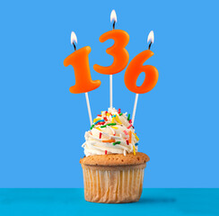 Wall Mural - Orange birthday candle and cupcake - Number 136.