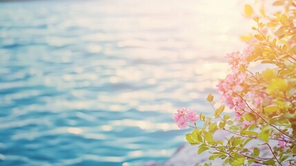 Poster - Serene coastal scene featuring delicate pink blossoms overlooking the shimmering blue expanse of the sea