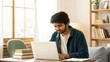 © Jo - Indian Student Using a Laptop for Online Learning