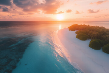 Wall Mural - Aerial view of a breathtaking sunrise over the a beautiful beach