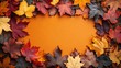 © kura - Autumnal Foliage Framing an Orange Background with Vibrant Colors