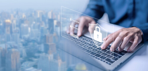 Wall Mural - laptop shows the icon lock shield for cybersecurity. concept of secure privacy data, protect cybercr