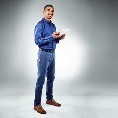 Poster - Happy, portrait or businessman with tablet in studio for creative design, project or development on a white background. Male person, designer or model with smile or technology for app on mockup space