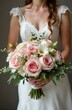 © chelmicky - Bride holding pink rose wedding bouquet: elegance and romance