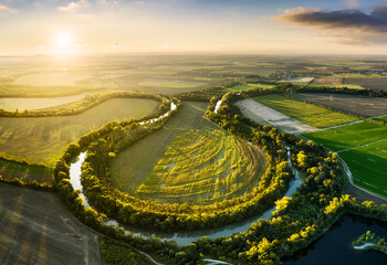 Wall Mural - sunset at danube river meandering through romantic slovakia countryside nature landscape near senec 