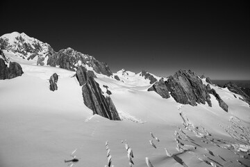 Wall Mural - Flying over the southern alps mountain range snow covered peaks