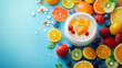 © Exsinghas - Fresh fruits surround creamy dessert on vibrant blue background, creating colorful and appetizing display. arrangement includes oranges, berries, and mint leaves, evoking refreshing feel