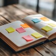 © ruangrit19 - Open Notebook with Sticky Notes Symbolizing New Ideas and Adaptable Skills