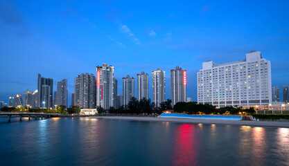 Wall Mural - City night view by the sea, Beihai, China.