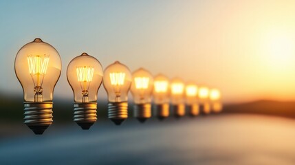 Aufkleber - A row of bright light bulbs hanging against a dark background creating ambiance