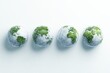© vinod - four Earth globes with a wire mesh