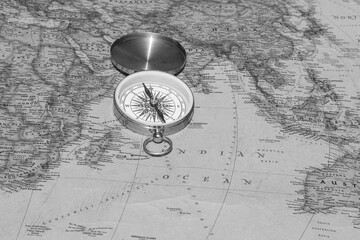 Wall Mural - classic round compass on background of old vintage map