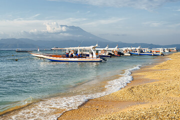 Wall Mural - Awesome view of tourist boats anchored off the Toyapakeh beach