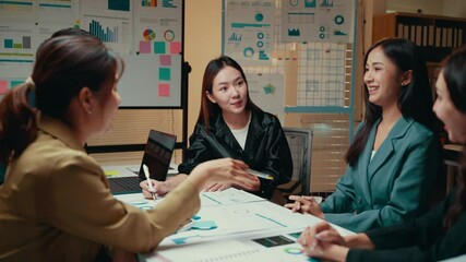 Poster - Asian businesswomen discussing marketing strategy during a meeting
