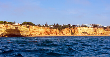 Wall Mural - The Algarve Rocks Formation is a unique and stunning natural wonder located in the coastal town of Porches Portugal