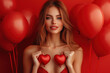 © Mis_TiKa - portrait of stunning lady raise fists hold heart shape balloons empty space isolated on red color background