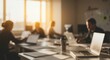 © Firman Dasmir - Blurred open-plan office with professionals working in a productive environment