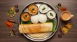 © Firman Dasmir - Authentic south indian breakfast thali with masala chai and aromatic spices