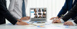 © InfiniteFlow - Business people on video conference for brisk virtual group meeting of corprate business office workers
