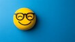© Biggy - Studious emoji on blue background