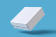 © Arthur Woods - Mockup white box float on blue background