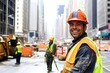 © Oleh - Smiling construction worker wearing hard hat and safety vest in new york city
