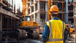 © Jhati - Construction worker safety vest yellow hardhat building site man job city urban crane helmet uniform
