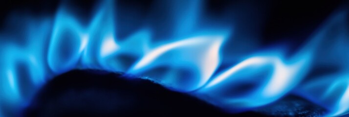 Leinwandbilder - Bright blue gas flame burning intensely in a close up view showcasing its vibrant hues and energy dynamics. Generative AI