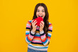 © Olena - Amazed teenager. Valentines Day. Dreaming cute teen child with red heart. Excited teen girl.