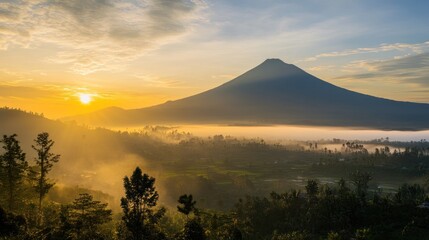 Wall Mural - Majestic Sunrise Over Misty Valley and Volcano