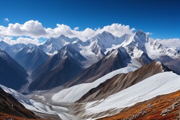 Wall Mural - mountains with snow on them and a valley below