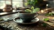 © Student - Cup of hot tea with fresh mint leaves