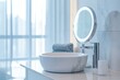 © LimeSky - Compact round makeup mirror next to a marble sink and steel faucet by a large window with concealed lighting Contemporary white bathroom decor