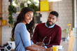© Daniel2000/peopleimages.com - Drink, orange juice and portrait of couple in coffee shop together for bonding or start of morning. Beverage, love or smile of man and woman in cafe or restaurant for dating, relationship or romance