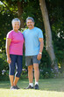 © peopleimages.com - Portrait, fitness or elderly couple at park for workout, training or bonding together for exercise. Retirement, man and happy woman for sports practice, body wellness and support for outdoor health