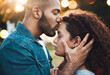 © peopleimages.com - Love, couple and kiss at park together for sunset date, romance or commitment in relationship. African people, affection or support in marriage with trust, loyalty and protection with bonding or care