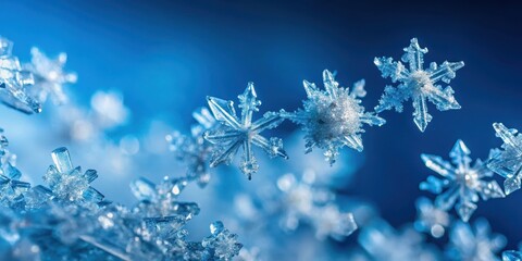 Wall Mural - tiny transparent ice crystals suspended in air on a clear blue background, microscopic, crystal