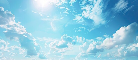 Aufkleber - Vast blue sky with soft white clouds spread across the upper half and bright sunlight illuminating the scene creating a serene atmosphere