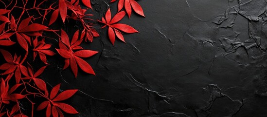 Poster - Elegant black background with textured surface, featuring vibrant red leaves cascading from the top left corner, creating a striking contrast.