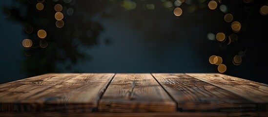 Poster - Rustic wooden table in the foreground with a dark blurred background featuring soft warm bokeh lights creating a stylish product display space