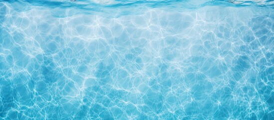 Poster - Crystal clear turquoise water surface texture with gentle ripples and soft reflections creating a serene aquatic background.
