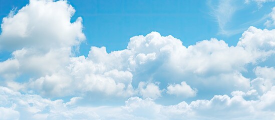 Aufkleber - Serene spring sky with pale blue backdrop featuring picturesque fluffy white clouds filling the upper two-thirds of the image for tranquil atmosphere