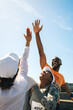 © Jacob Lund - Joyful marathon participants celebrate with high fives and laughter